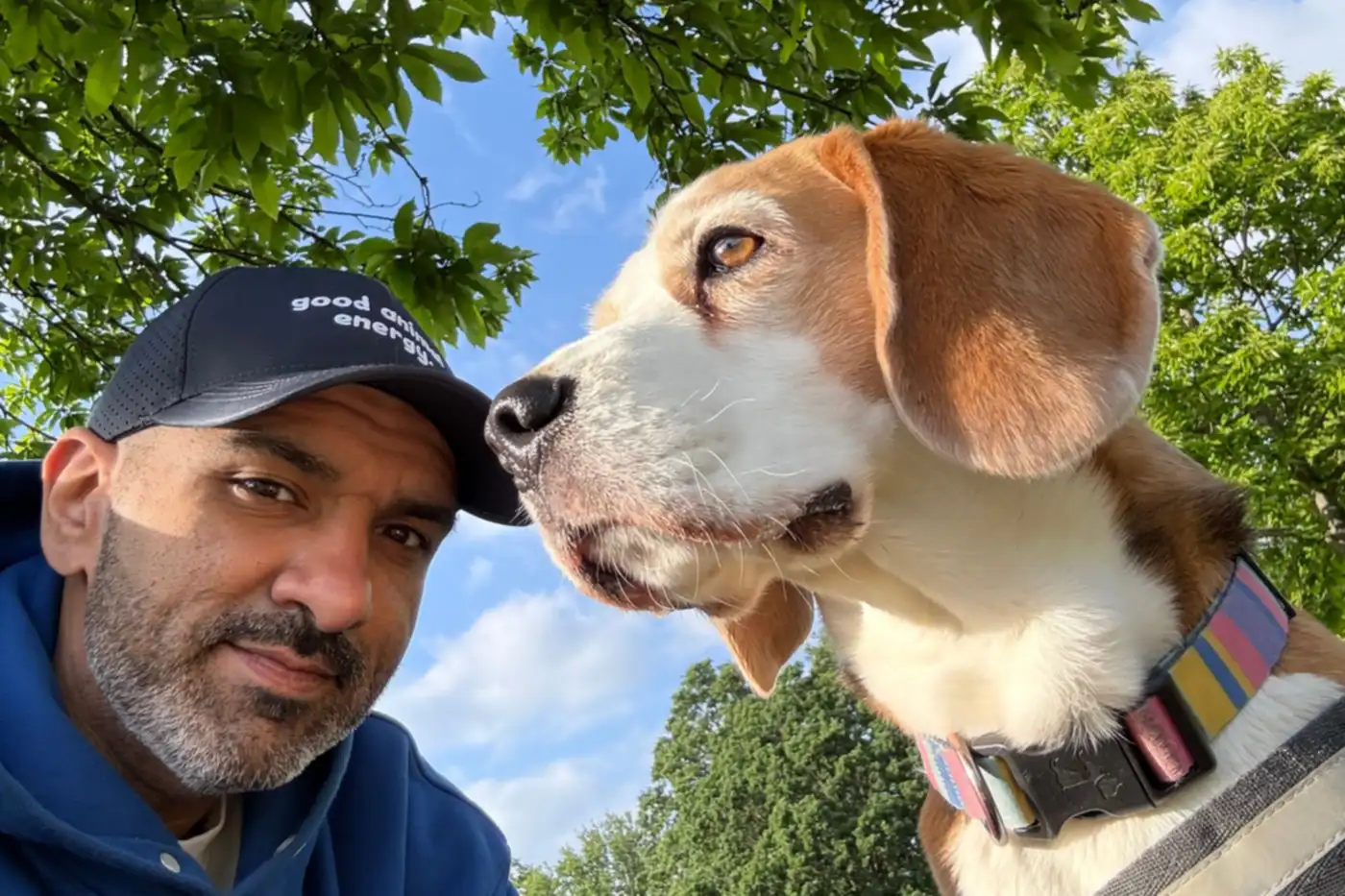 Gautam Khorana and Jazz the beagle on an early-morning walk in a London park